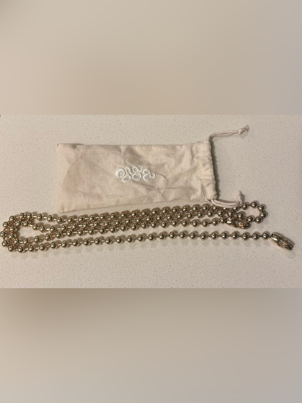 OSSA NYC gold ballchain cross body strap